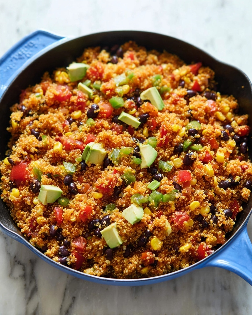 The image shows a close-up of a colorful quinoa salad full of small, round quinoa grains mixed with bright yellow corn kernels, dark black beans, and small green chunks of avocado. There are also pieces of red tomatoes and bits of green herbs scattered throughout. A wooden spoon with a smooth texture is scooping the salad, creating a layered effect with the grains and vegetables clearly visible in the spoon as well as around it, all placed on a white marbled surface. photo taken with an iphone --ar 4:5 --v 7