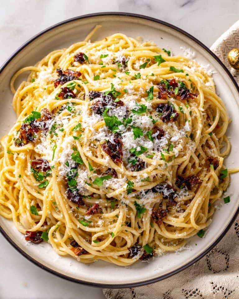Caramelized Onion Pasta with Sundried Tomatoes and Chili Crisps Recipe